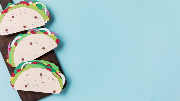 Paper tacos on wooden board frame