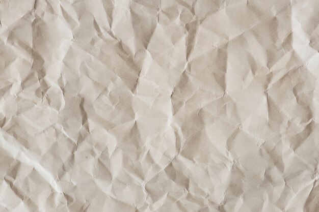 Brown burlap laying on white sheet. Abstract background. Texture