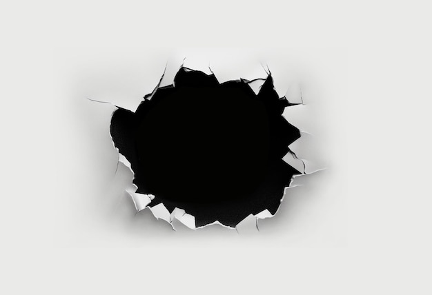 Бесплатное фото Разорванная бумага с черной дырой посередине
