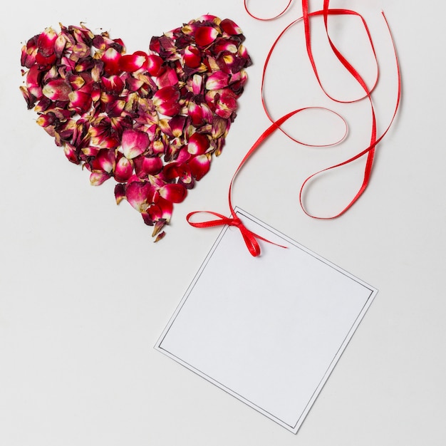 Paper with band near heart of flowers