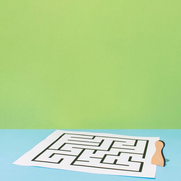 Paper with maze high angle