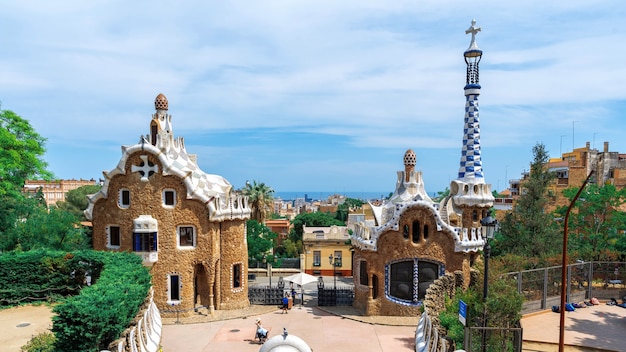 Parc Guel buildings with unusual architectural style cityscape on the background