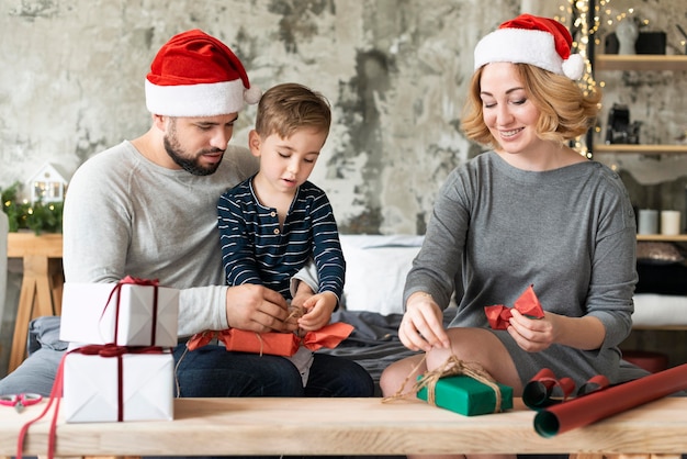 Parents and child being together on christmas day