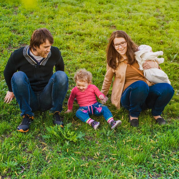 Parents enjoying their children outdoors