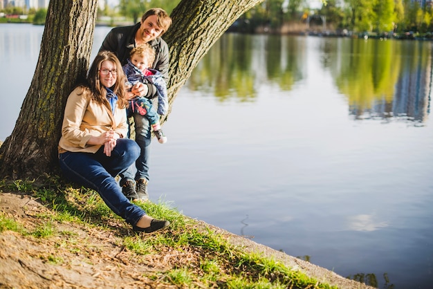 Parents enjoying with their son outdoor