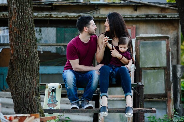 Parents sitting with a baby