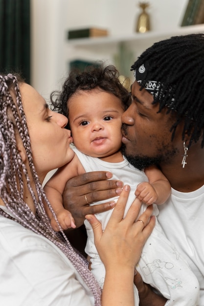 Free photo parents spending time with baby