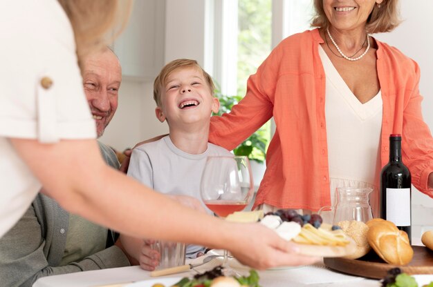 Parents spending time with their daughter and grandson