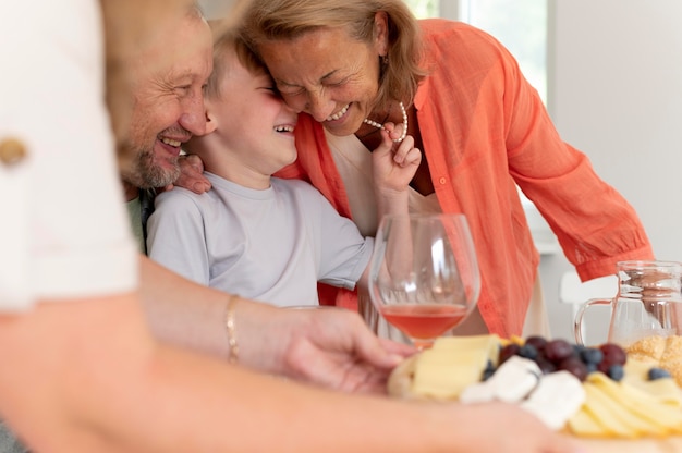 Parents spending time with their daughter and grandson