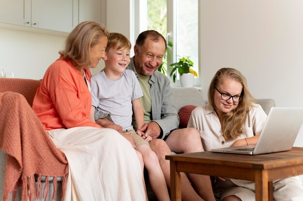 Parents spending time with their daughter and grandson