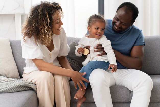 Parents spending time with their daughter