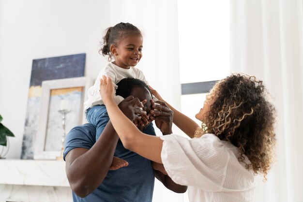 Parents spending time with their daughter