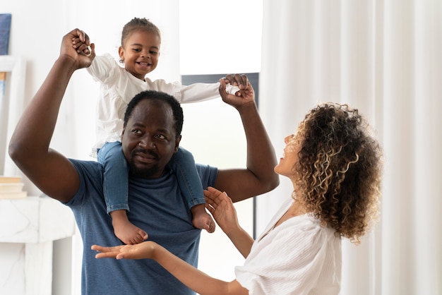 Parents spending time with their daughter