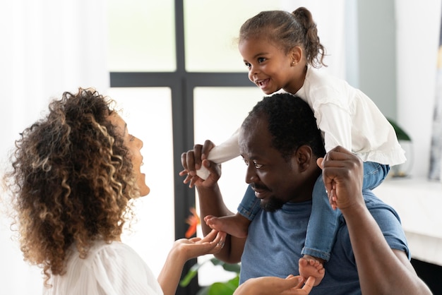 Parents spending time with their daughter