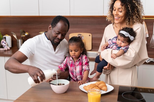 Parents spending time with their little daughters