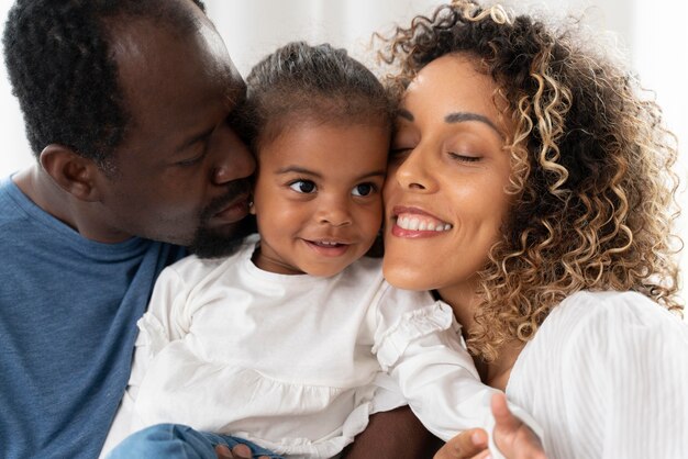 Parents spending time with their little girl