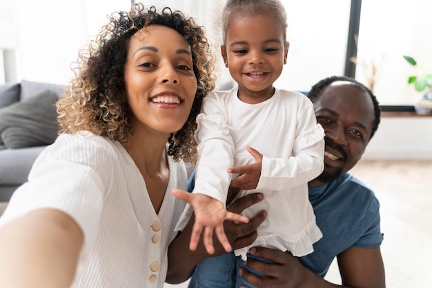 Parents spending time with their little girl