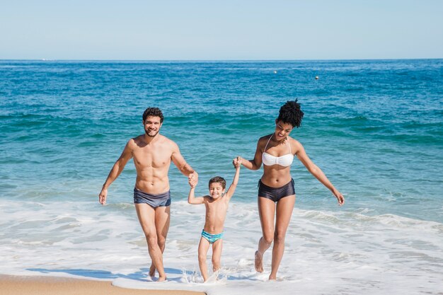 Parents with son at the beach