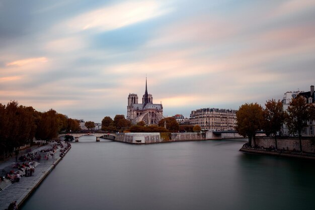 Paris city view with Notre Dame Cathedral over river Seine.