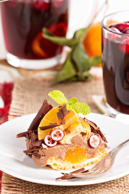 ParisBrest cake with chocolate and tangerines