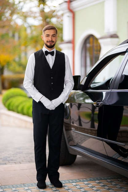 Parking valet taking care of customer vehicle