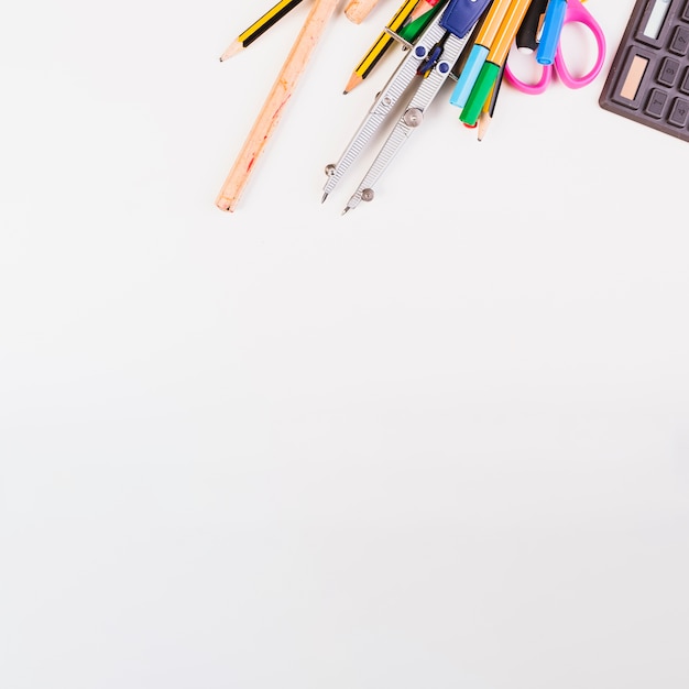 Part of calculator and stationery on top side