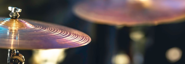 Free photo part of a drum kit in the dark with beautiful lighting