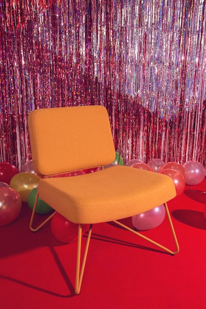 Party decoration with chair and balloons