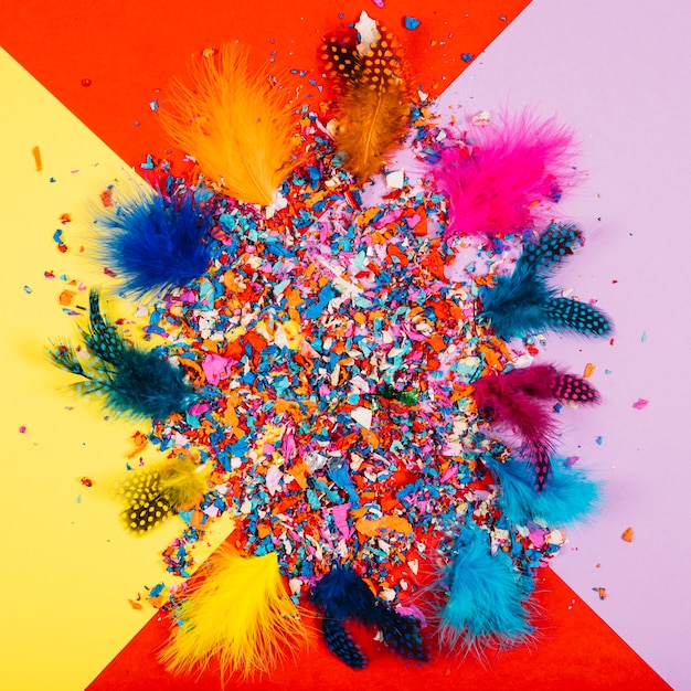 Party decoration with confetti and feathers