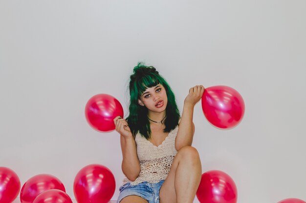 Party girl with two balloons