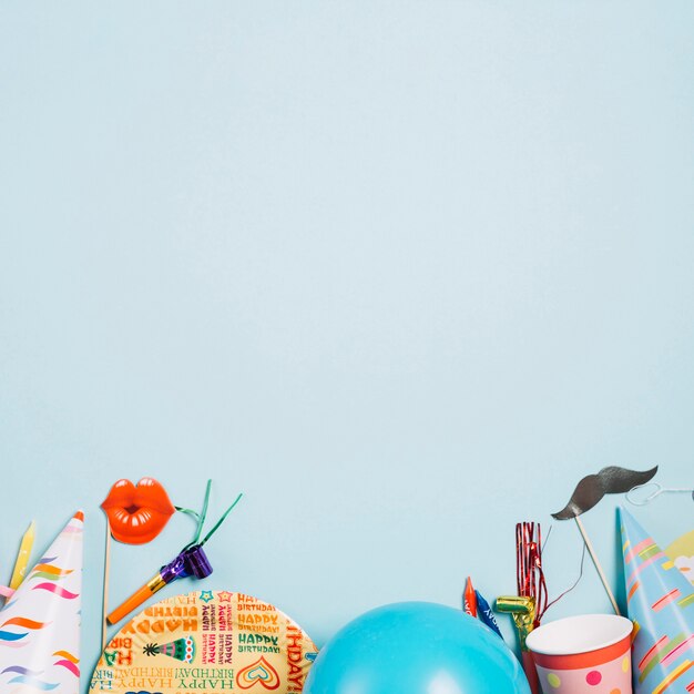party supplies on blue background