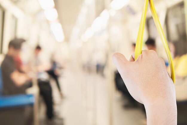 Passenger travel in subway train in Thailand - people and public transport concept 