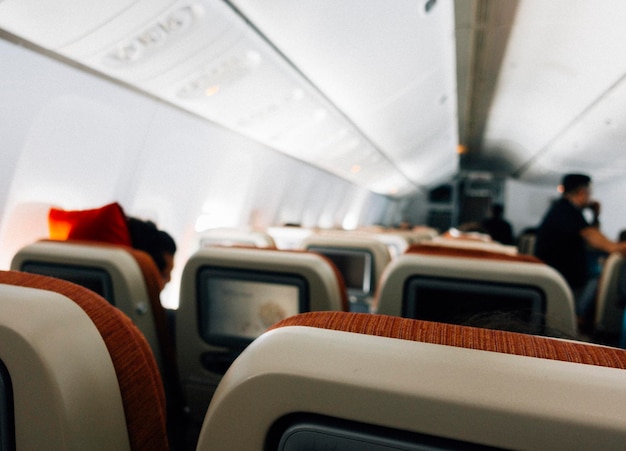 Free photo passengers in an economy class airplane