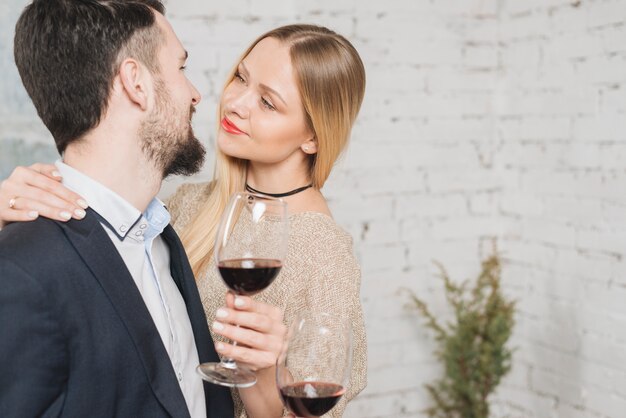 Passionate content couple having wine