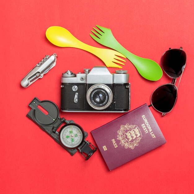 Passport and tourist supplies around camera