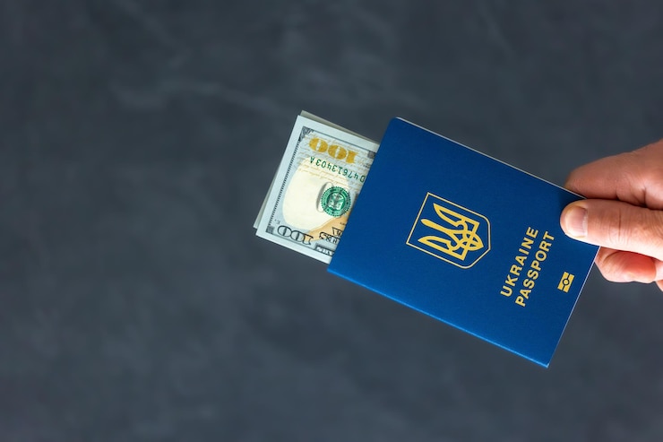 Free Photo passports money exchange ukrainian passport emigration concept