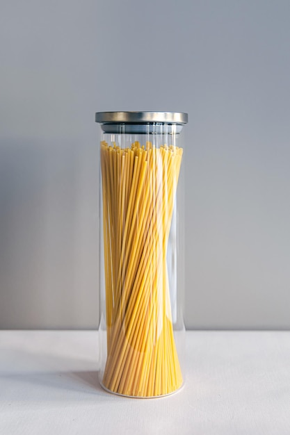 Pasta in a jar isolated on white background