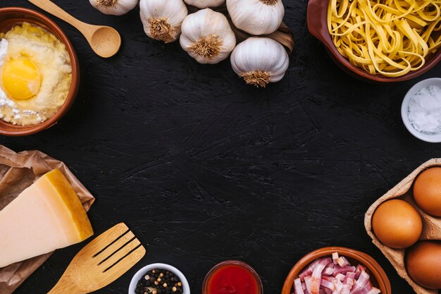 Pasta near utensils and ingredients