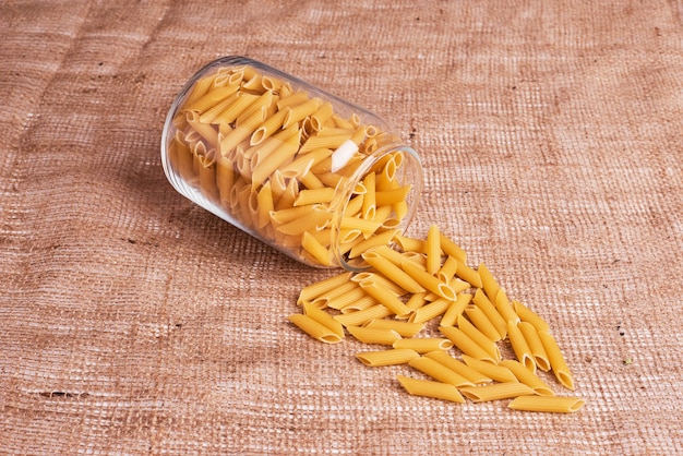 Pasta out of a glass jar. 