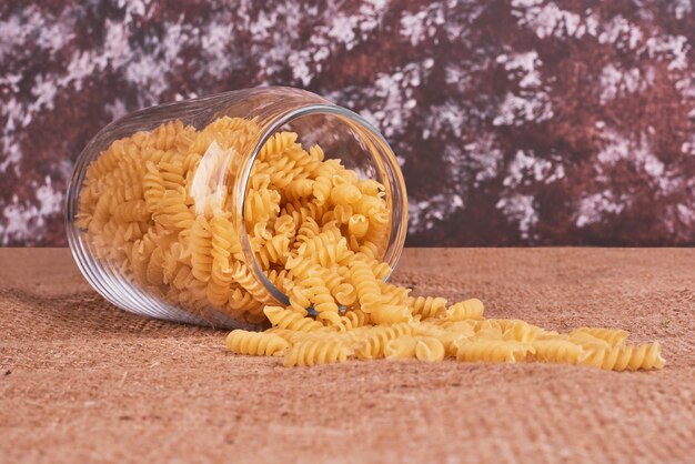 Pasta out of a glass jar. 