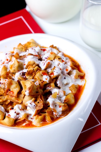 Pasta prepared in sauce and served with sour cream