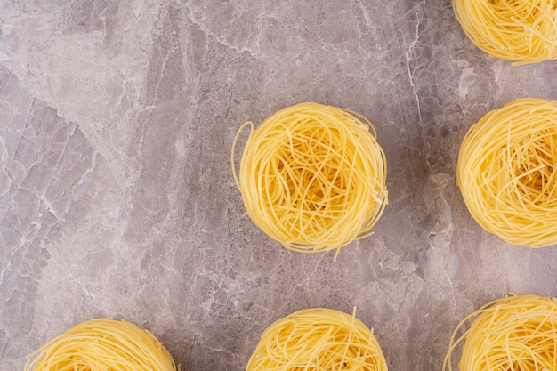 Pasta tops isolated on the marble surface
