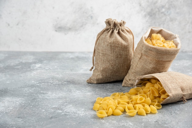 Pasta varieties inside rustic pockets.