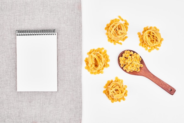 Pasta varieties with a blank paper aside.