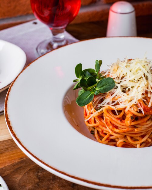 Pasta with grated cheese and basil