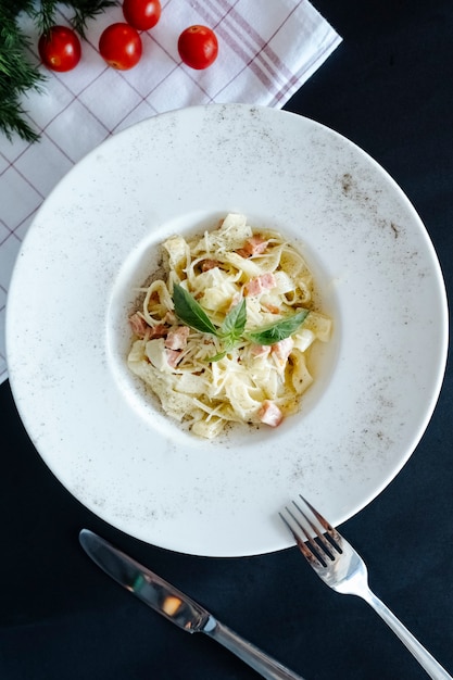 Pasta with grated cheese and herbs