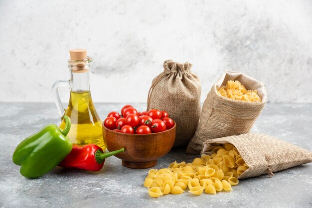 Pastas in rustic bags served with cherry tomatoes, chilies and olive oil.