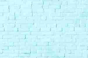 Free photo pastel blue brick wall textured background