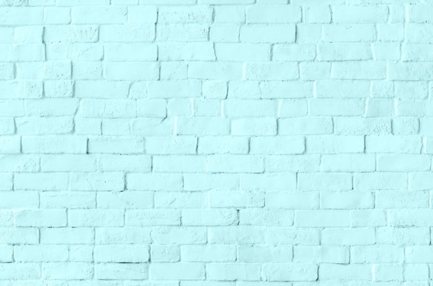 Pastel blue brick wall textured background