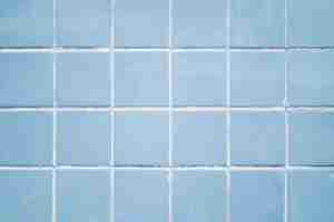 Free photo pastel blue tiles textured background